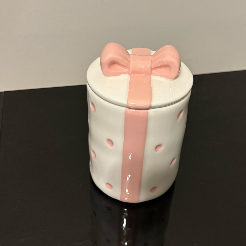 Coquette bow ceramic jar.